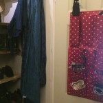 Wall tidy hanging on door.